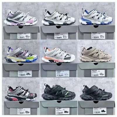 Chunky trainers lined up on top of their shoe boxes